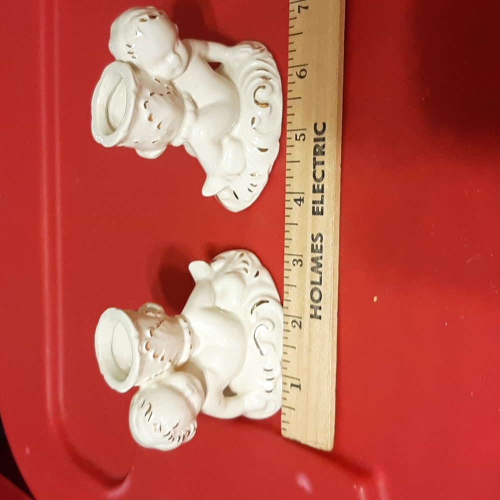 A pair of cherb candle sticks. Homemade